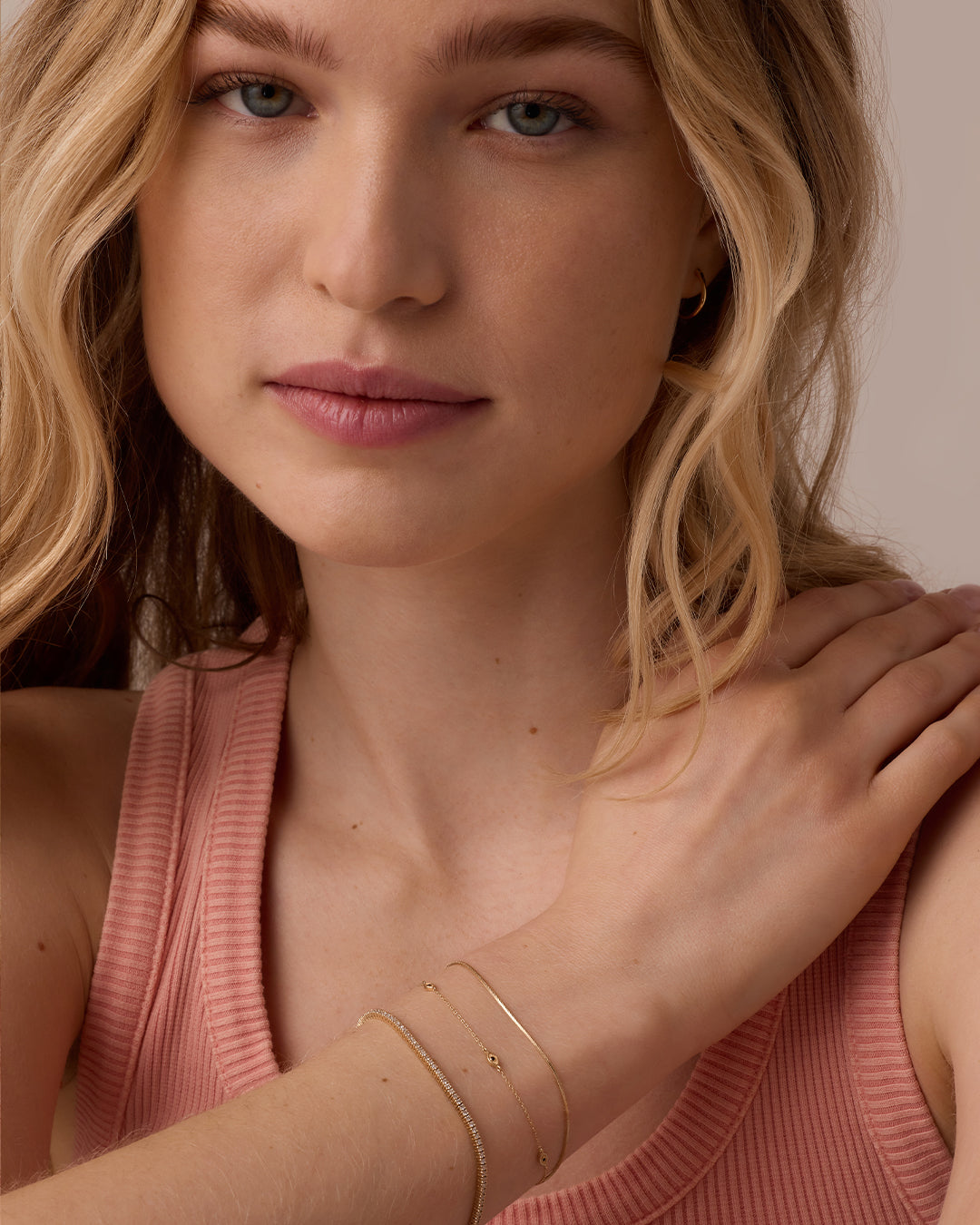 Woman wearing Micro Mini Venice Bracelet || option::14k Solid Gold, 6.5 in.