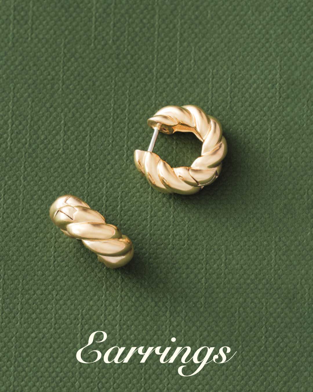 Gold plated twisted huggie earrings. Earrings