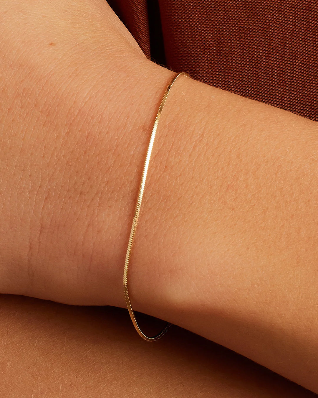 Woman wearing Micro Mini Venice Bracelet || option::14k Solid Gold, 6.5 in.