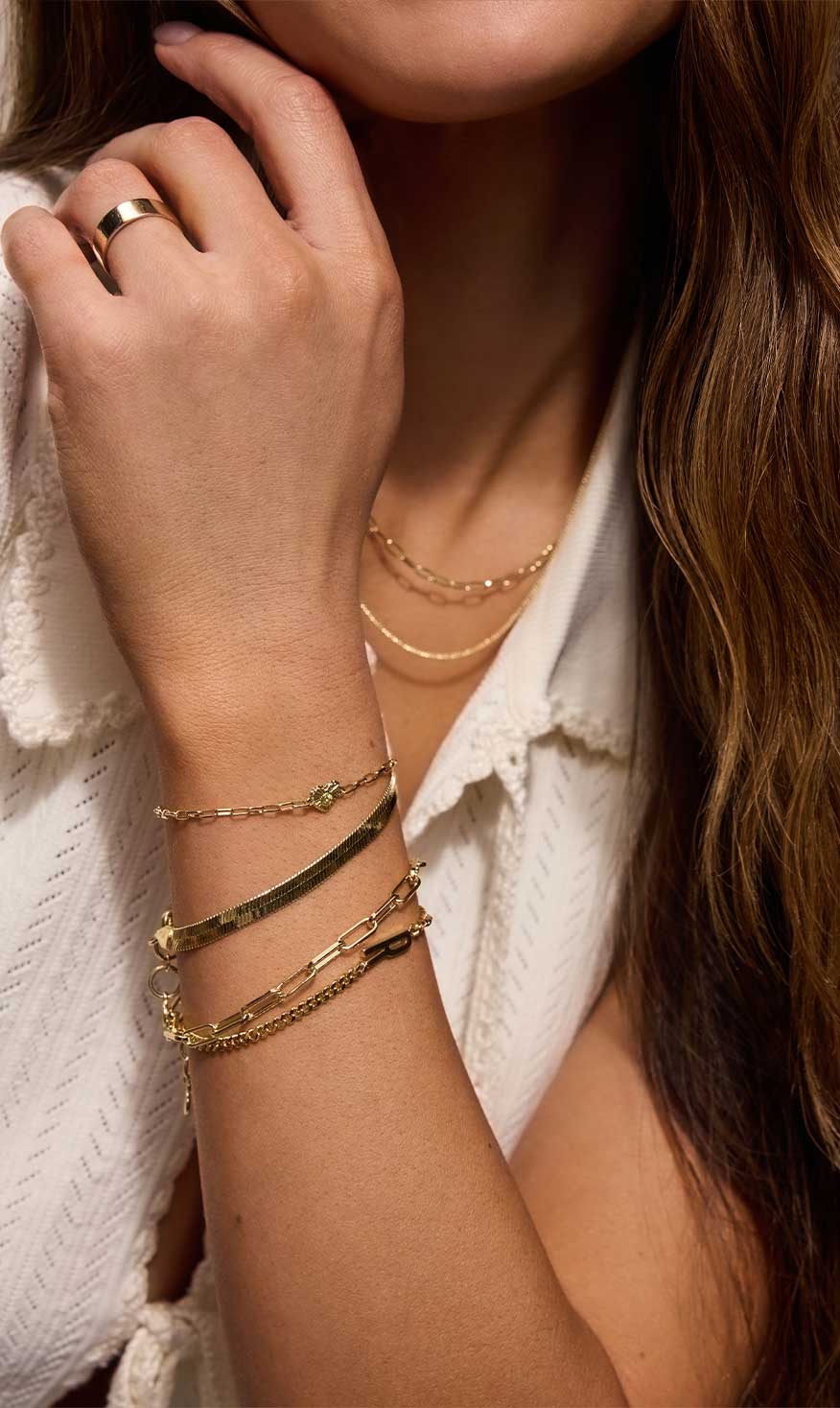 woman wearing best selling gold plated bracelets