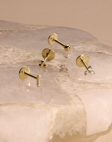 solid gold flat back earrings