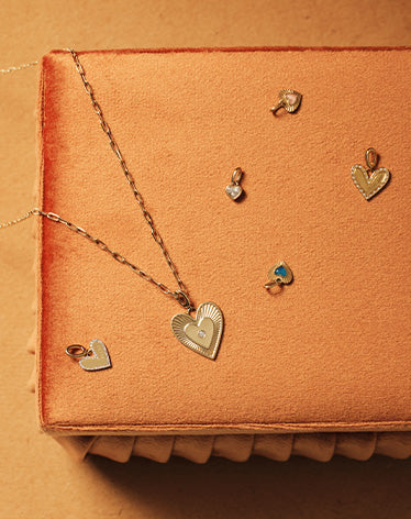 solid gold chains and charms