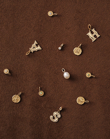 solid gold charms