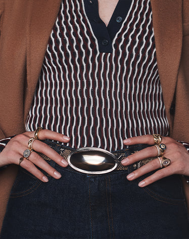 woman wearing statement rings
