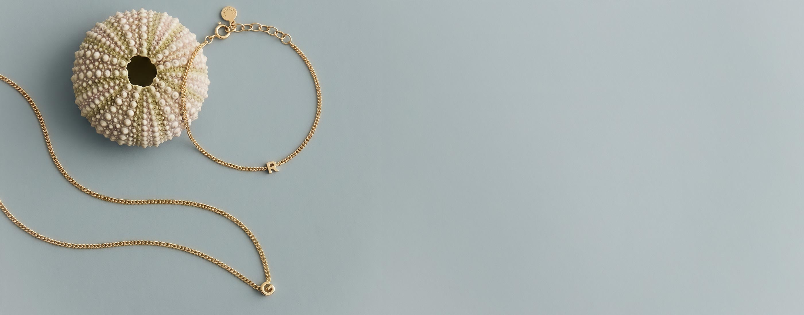 gold plated initial styles with shell