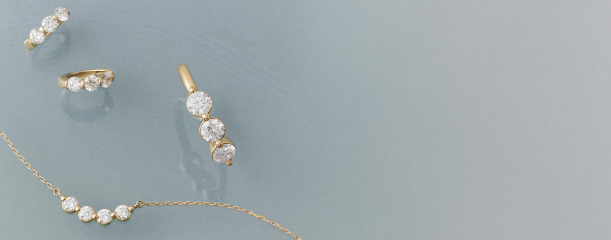 Lab Grown diamond earrings, rings and necklace.
