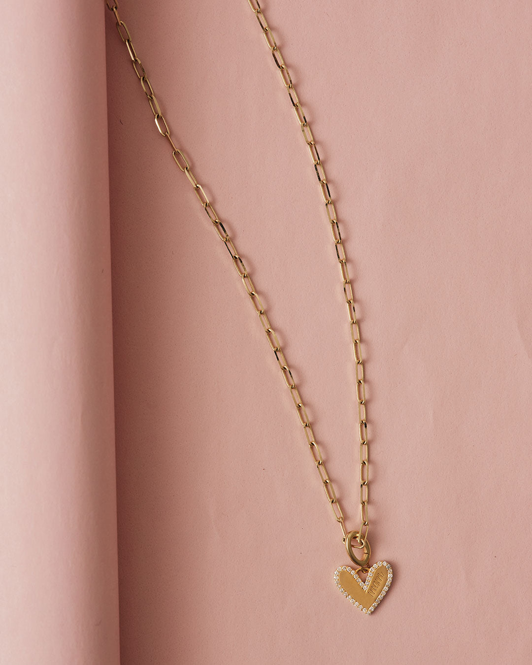 solid gold necklace and heart charm. Shop Necklaces