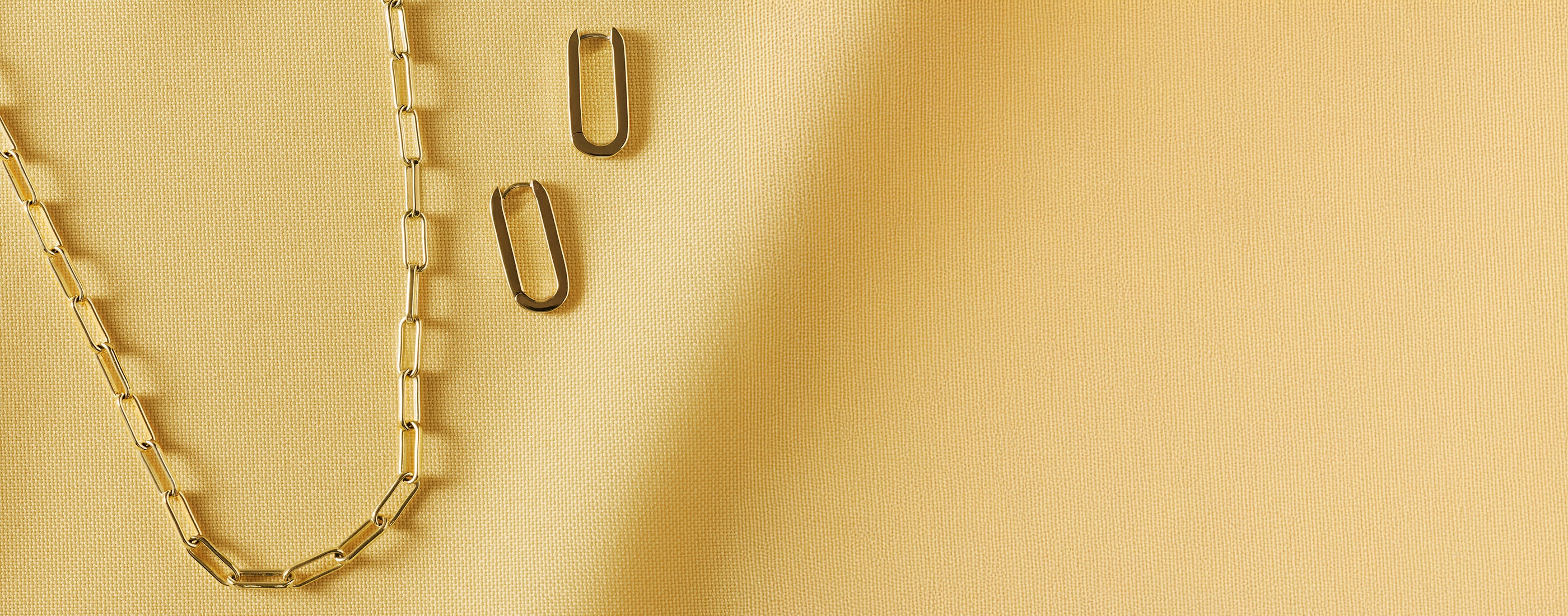 gold chain link necklaces and earrings