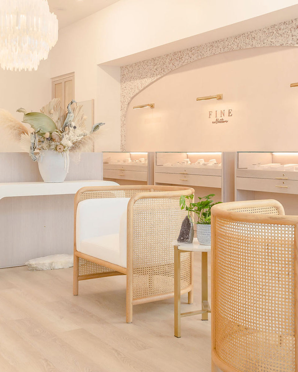 fine jewelry section of gorjana store with seating area